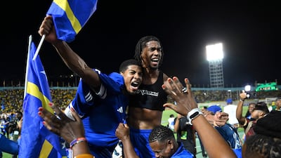 Curacao players and fans celebrate World Cup 2026 qualification. AFP