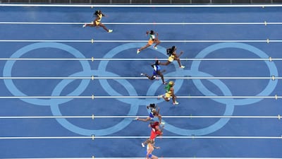 An overview shows (top to bottom) Jamaica’s Christania Williams, Ivory Coast’s Marie-Josee Ta Lou, Jamaica’s Elaine Thompson, USA’s Tori Bowie, Jamaica’s Shelly-Ann Fraser-Pryce, USA’s English Gardner, Trinidad and Tobago’s Michelle-Lee Ahye and Netherlands’ Dafne Schippers competing in the women’s 100m final during the athletics event at the Rio 2016 Olympic Games at the Olympic Stadium in Rio de Janeiro on August 13, 2016. Antonin Thuillier / AFP