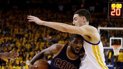 Kyrie Irving, left, of the Cleveland Cavaliers drives against Klay Thompson of the Golden State Warriors in the third quarter during Game One of the 2015 NBA Finals at ORACLE Arena on June 4, 2015 in Oakland, California. Ezra Shaw/Getty Images