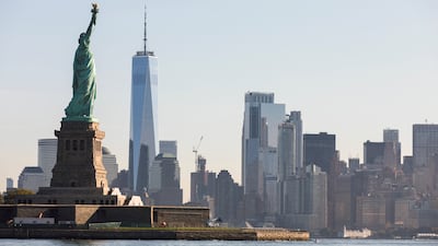 The Statue of Liberty and the skyline of Manhattan is seen from the water in New York. Reuters
