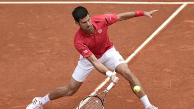 Novak Djokovic returns a ball to Roberto Bautista during the Madrid Open on May 5, 2016. Javier Soriano / AFP