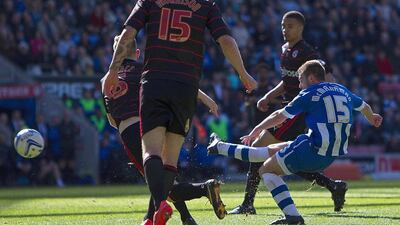 Here is another angle of McManaman's goal for Wigan. Clive Brunskill / Getty Images