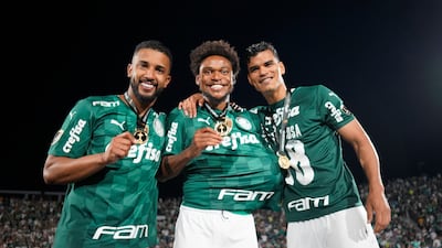 Palmeiras' Luiz Adriano, centre, celebrates winning the Copa Libertadores with teammates. Reuters