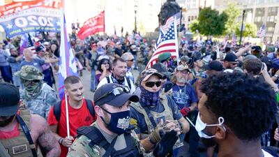 Far-right activists and self-described militia members gather to confront Black Lives Matter activists on the day of the Kentucky Derby horse race in Louisville, Kentucky, on September 5, 2020. Reuters