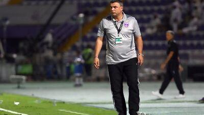 Suspensions to Mirel Radoi and Yousef Ahmad from the Al Ahli game left Al Ain coach Cosmin Olaroiu in no mood to celebrate the Pro League title after their 3-0 win over Dubai.