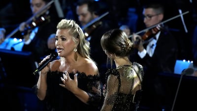 Pop singer Anastacia, left, performs with Alessandra Amoroso in the Paul VI Hall at the Vatican during the Christmas concert. AP Photo
