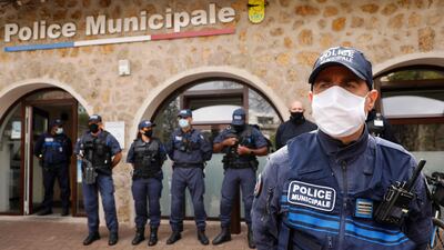 File photo: French municipal policemen stand outside the police station. AFP