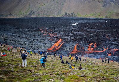 Tourists in the valley of Natthagi near Mount Fagradalsfjall, southwest of Iceland's capital Reykjavik. AFP