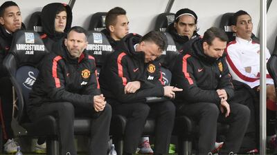 Manchester United manager Louis van Gaal drops his head during his side's 2-1 Premier League loss to Swansea City at the Liberty Stadium on Saturday. Rebecca Naden / Reuters