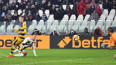 Cristiano Ronaldo scores the opening goal during the 3-3 draw with Parma on February 2, 2019. EPA