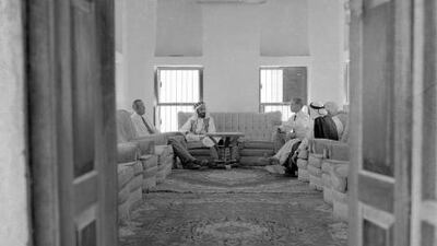 An official reception at Qasr al Hosn in 1962, hosted by Sheikh Shakhbut for oil industry executives.