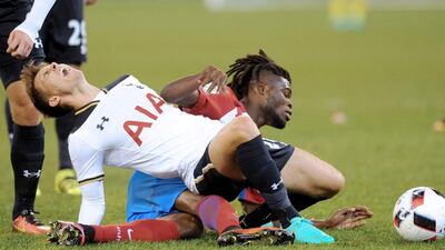 Thomas Partey of Atletico Madrid tackles Tom Carroll of Tottenham Hotspur, during the third match of the International Champions Cup between Atletico Madrid vs Tottenham Hotspurs, at the MCG in Melbourne, Australia, 29 July 2016. EPA/JOE CASTRO