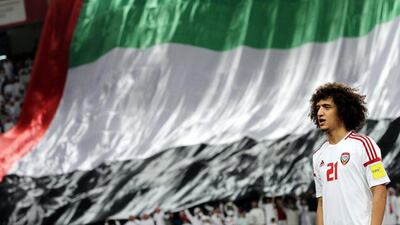 Omar Abdulrahman of the UAE stands for the natioanl anthem before a match against Saudi Arabia in March. Ali Haider / EPA