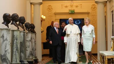 Pope Francis walks with Mr. Higgins at Aras an Uachtarain. Maxwell Photography via Getty Images