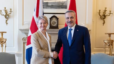Turkish Foreign Minister Hakan Fidan with UK Foreign Secretary Yvette Cooper. Getty Images