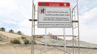 Signs on Ras Al Khaimah's public beaches warn beach-goers to dress modestly. Courtesy Ras Al Khaimah Police