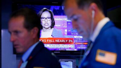 Traders working on the floor at the New York Stock Exchange (NYSE) last Wednesday, when stocks fell nearly 3 per cent. Photo: Reuters