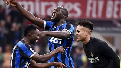 Inter Milan players celebrate at the final whistle. AFP