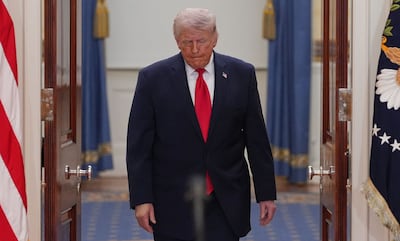US President Donald Trump arrives to speak at a televised address. AFP