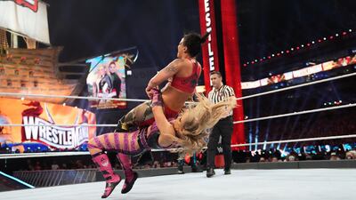 Natayla and Shayna Baszler during the Women's Tag Team Championship match at WrestleMania 37. Courtesy WWE