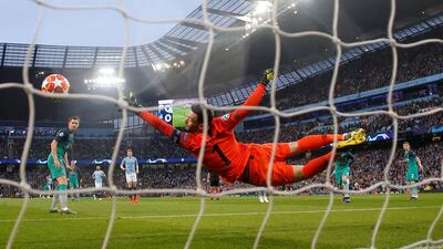 Manchester City's Raheem Sterling scores their first goal. Reuters