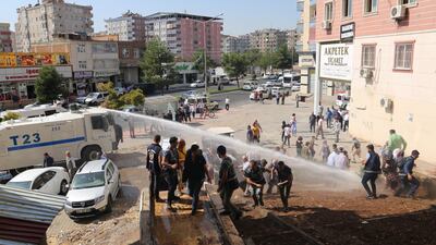 Police in Diyarbakir use a water cannon to disperse pro-Kurdish demonstrators. Reuters
