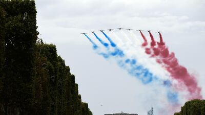 The French national air display team Patrouille de France perform over Arc de triomphe monument. AFP