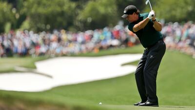 Phil Mickelson hits from the fairway on the first hole during the first round of the PGA Championship golf tournament at the Quail Hollow Club Thursday, August 10, 2017, in Charlotte. Chuck Burton / AP Photo