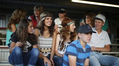 Teenagers watch the rodeo in Truth or Consequences, New Mexico. Many agree that Spaceport America should inject new energy into the town. Lucy Nicholson / Reuters