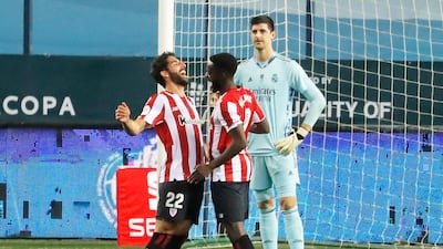Athletic Bilbao's Raul Garcia celebrates with Inaki Williams after scoring against Real Madrid. Reuters