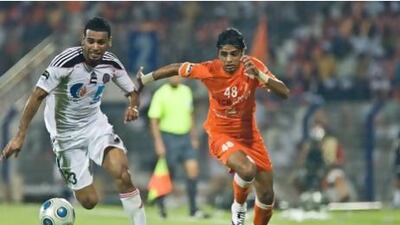 Al Jazira’s Khalid Sabeel, left, and Ajman’s Mohammed Yakoub battle for control of the ball during the Etisalat Cup in 2010. Al Jazira won, 2-0. Amy Leang / The National