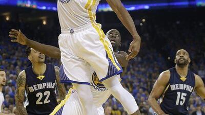 Golden State Warriors forward Andre Iguodala (9) grabs a rebound during the first half of an NBA basketball game against the Memphis Grizzlies in Oakland, California, Wednesday, April 13, 2016. (AP Photo/Marcio Jose Sanchez)