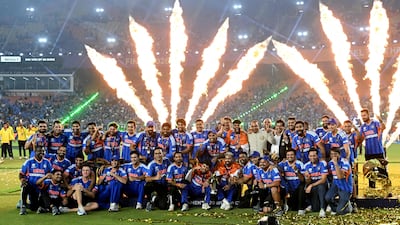 India's players celebrate with the trophy after winning the T20 World Cup final. AFP