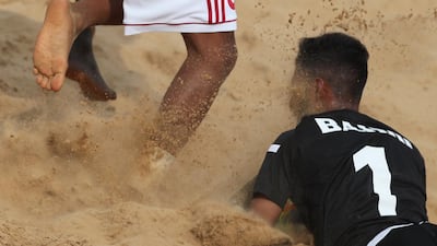 Senegal's Mamour Diagne vies for the ball against Mohamed Aljasmi of United Arab Emirates. EPA