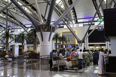 Passengers at Muscat International Airport, Oman. Bloomberg