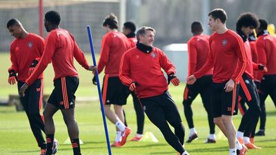 Manchester United’s German midfielder Bastian Schweinsteiger (C) takes part in a team training session at their Carrington Training Centre in Manchester, north west England on March 16, 2016 ahead of their Uefa Europa League second leg football match against Liverpool. AFP / Paul ELLIS