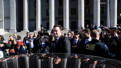Elon Musk exits after attending a SEC hearing at the Manhattan Federal Courthouse in New York. There was no mention in the court papers of any new fines or additional controls on Mr Musk, which had been a possibility. Reuters