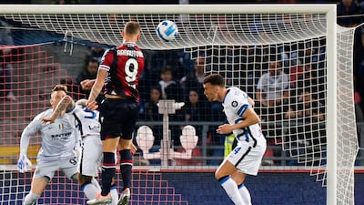 Marko Arnautovic heads home the equalising goal for Bologna against Inter Milan. EPA