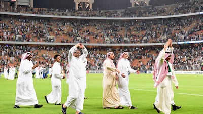 JEDDAH, SAUDI ARABIA - SEPTEMBER 05: Saudi Arabia royals family members celebrate their 1-0 victory and quaification for the FIFA World Cup Russia after the FIFA World Cup qualifier match between Saudi Arabia and Japan at the King Abdullah Sports City on September 5, 2017 in Jeddah, Saudi Arabia. (Photo by Kaz Photography/Getty Images)