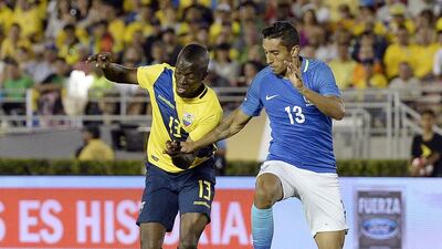 Enner Valencia, left, of Ecuador and Marquinhos of Brazil battle for the ball. Kevork Djansezian / Getty Images