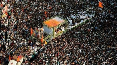 An estimated two million people lined the streets of Mumbai to catch a glimpse of the glass coffin carrying the body of Balasaheb Thackeray, the founder of Shiv Sena party who died yesterday.