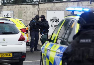 Police Scotland officers take part in a role-play exercise involving an armed policing response stopping a suspect in a vehicle while taking part in Cop26 public order training at the Scottish Police College Jackton in East Kilbride.