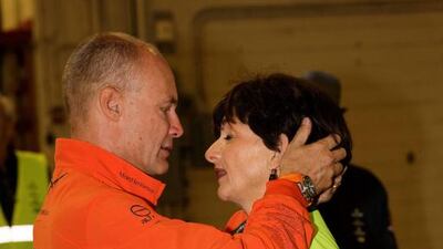 Bertrand Piccard says an emotional goodbye to wife Michelle before beginning preparations to fly the Solar Impulse plane to Spain. Trevor Collens / AFP