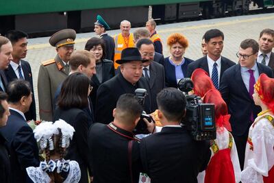Kim Jong-un takes part in a welcoming ceremony at the railway station. Reuters
