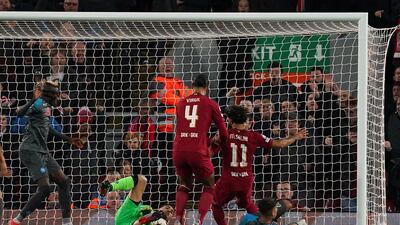 Liverpool's Mohamed Salah scores the opening goal. PA