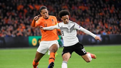 Virgil van Dijk of Liverpool in action for Holland against Germany's Leroy Sane of Manchester City. Sane scored as Germany ran out 3-2 winners. Reuters