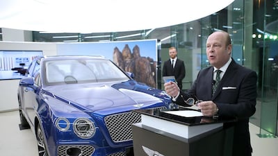 Karl Hamer, the managing director of Al Habtoor Motors, delivers his speech before the opening at the new Al Habtoor Motors and Bentley Emirates flagship showroom on Sheikh Zayed Road in Dubai. Ravindranath K / The National