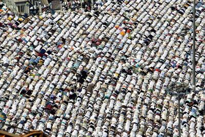 Tens of thousands of Muslim pilgrims performing the Hajj attend the Friday prayers inside and outside the Grand Mosque in Makkah. Salah Malkawi / The National