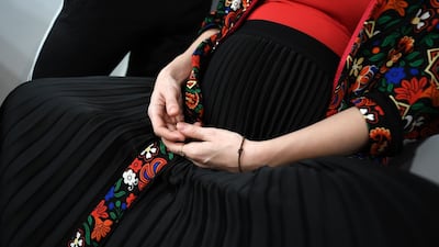 A Hungarian singer, wearing a creation by Hungarian Roma fashion designers of Romani Design. AFP