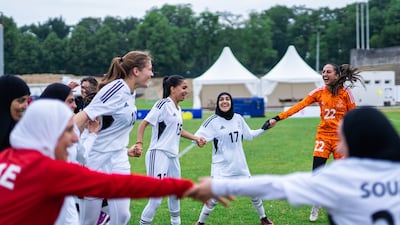 Members of the UAE women's football team in buoyant mood at the games
